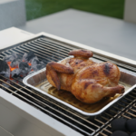 Grilled whole chicken on barbecue with charcoal.