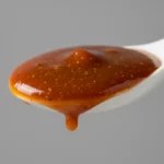 Nahaufnahme eines Löffels mit brauner Sauce – Finke-Blog107360