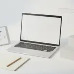 Finke-Blog749737: Laptop, Tablet und Notizbuch am Schreibtisch